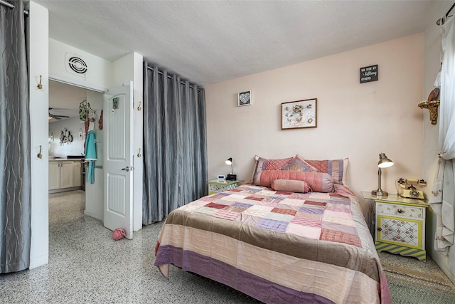 505 67th Ave Unit 11, St Pete Beach, FL 33706 - bedroom featuring dark speckled floor