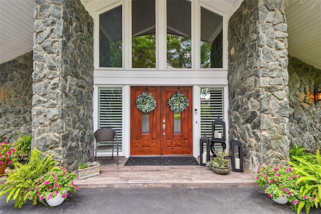 16205 Sentry Woods Ct, Odessa, FL 33556 - entrance to property with stone siding and french doors