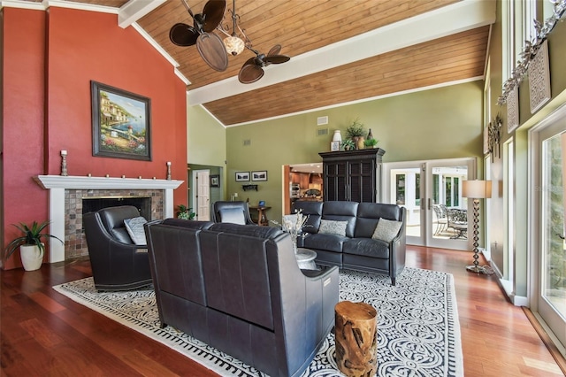 16205 Sentry Woods Ct, Odessa, FL 33556 - living area with a ceiling fan, a wooden ceiling with exposed beams, plenty of natural light, a fireplace, and wood finished floors