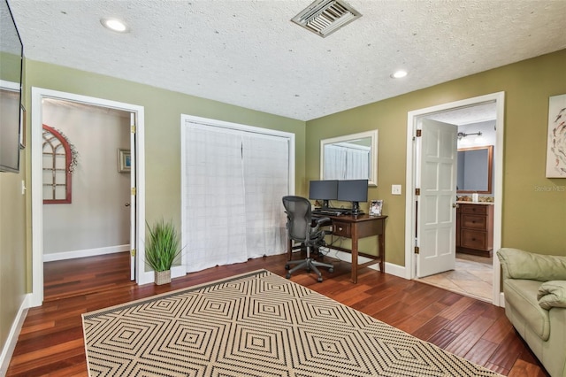 16205 Sentry Woods Ct, Odessa, FL 33556 - office space with hardwood / wood-style flooring, a textured ceiling, and recessed lighting
