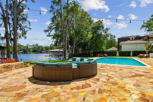 16205 Sentry Woods Ct, Odessa, FL 33556 - outdoor pool featuring an outdoor living space, a patio, and a water view