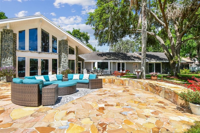 16205 Sentry Woods Ct, Odessa, FL 33556 - view of patio with french doors and an outdoor living space