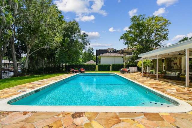 16205 Sentry Woods Ct, Odessa, FL 33556 - swimming pool with a patio and a ceiling fan