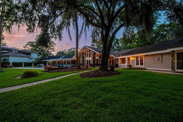 16205 Sentry Woods Ct, Odessa, FL 33556 - view of front facade featuring a front yard and a swimming pool