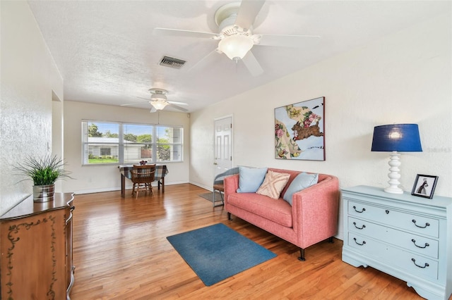 4211 28th Ave N, Saint Petersburg, FL 33713 - living area featuring a ceiling fan and light wood-type flooring