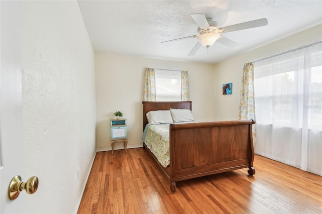 4211 28th Ave N, Saint Petersburg, FL 33713 - bedroom featuring light wood-style floors and a ceiling fan