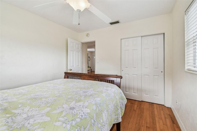 4211 28th Ave N, Saint Petersburg, FL 33713 - bedroom with a closet, wood finished floors, and ceiling fan