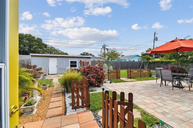 4211 28th Ave N, Saint Petersburg, FL 33713 - view of patio / terrace with outdoor dining area and an outdoor structure