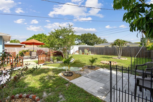 4211 28th Ave N, Saint Petersburg, FL 33713 - fenced backyard featuring a patio area