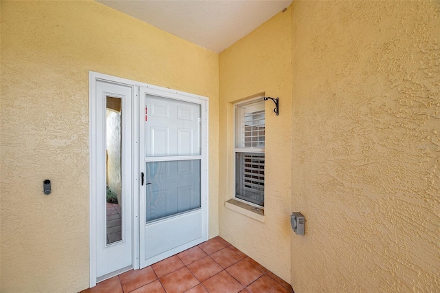 6400 46th Ave N Unit 61, Kenneth City, FL 33709 - property entrance with stucco siding