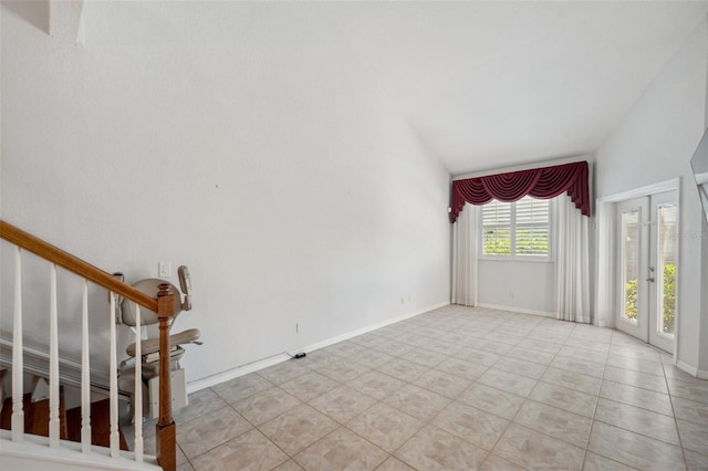 6400 46th Ave N Unit 61, Kenneth City, FL 33709 - unfurnished living room with stairs and baseboards