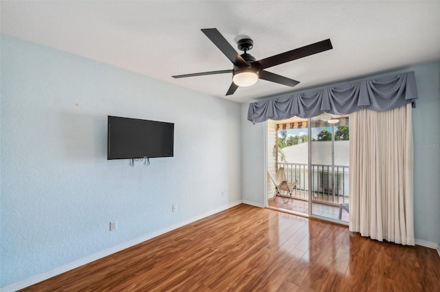 6400 46th Ave N Unit 61, Kenneth City, FL 33709 - spare room featuring a ceiling fan and wood finished floors