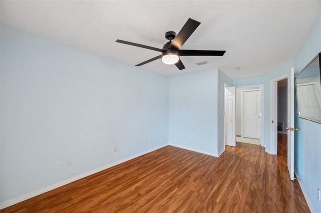 6400 46th Ave N Unit 61, Kenneth City, FL 33709 - unfurnished bedroom with wood finished floors and ceiling fan
