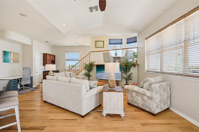 6543 Louise Ct, Hudson, FL 34667 - living room with vaulted ceiling, light wood finished floors, stairs, an office area, and ceiling fan