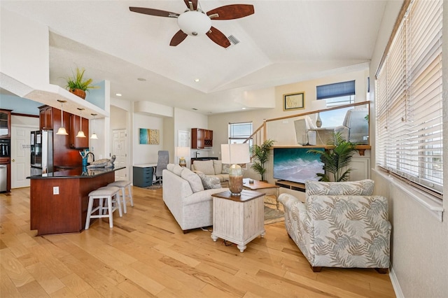 6543 Louise Ct, Hudson, FL 34667 - living room featuring ceiling fan, light wood-style floors, and lofted ceiling