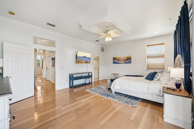 6543 Louise Ct, Hudson, FL 34667 - bedroom with light wood-style flooring and a ceiling fan
