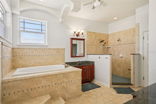 6543 Louise Ct, Hudson, FL 34667 - full bathroom featuring a garden tub, tile patterned floors, vanity, walk in shower, and a ceiling fan