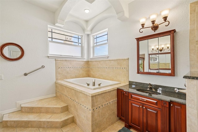 6543 Louise Ct, Hudson, FL 34667 - bathroom featuring a garden tub, tile patterned flooring, and vanity