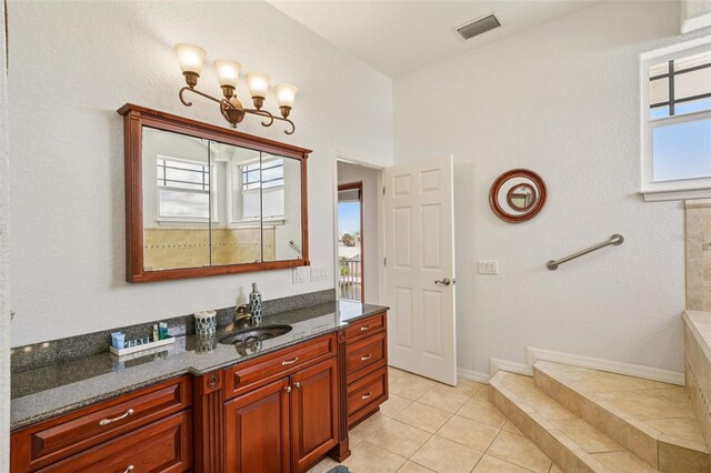 6543 Louise Ct, Hudson, FL 34667 - bathroom with vanity and tile patterned flooring