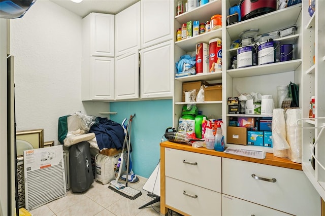 6543 Louise Ct, Hudson, FL 34667 - laundry area with light tile patterned floors
