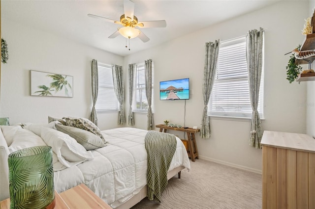 6543 Louise Ct, Hudson, FL 34667 - carpeted bedroom with ceiling fan and baseboards
