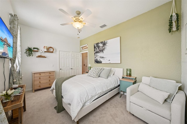 6543 Louise Ct, Hudson, FL 34667 - bedroom with light colored carpet and ceiling fan