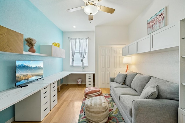 6543 Louise Ct, Hudson, FL 34667 - living area with light wood-style floors, a ceiling fan, and an office area
