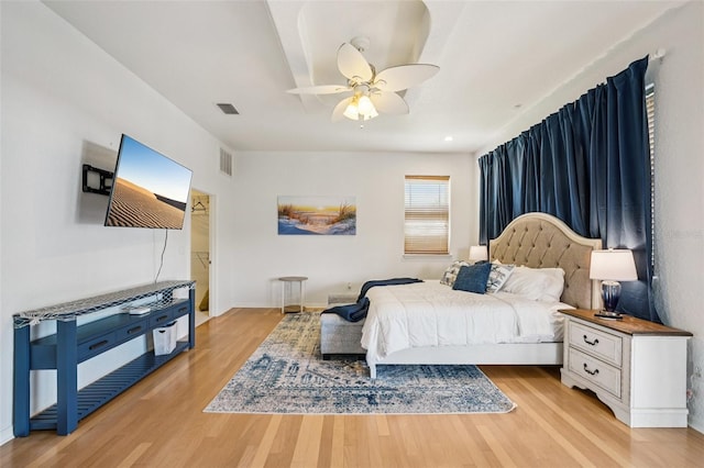 6543 Louise Ct, Hudson, FL 34667 - bedroom featuring light wood-type flooring and ceiling fan
