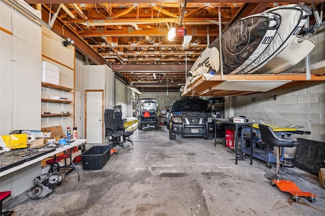 6543 Louise Ct, Hudson, FL 34667 - garage featuring a workshop area