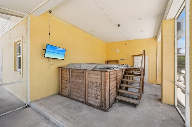 6543 Louise Ct, Hudson, FL 34667 - misc room featuring unfinished concrete floors and a textured wall