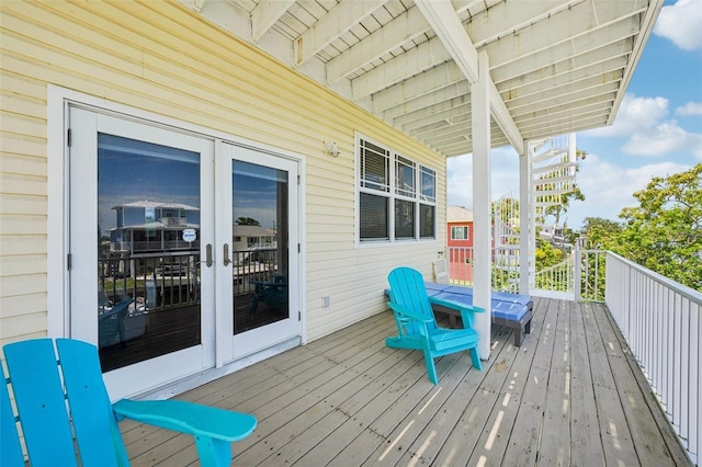 6543 Louise Ct, Hudson, FL 34667 - wooden terrace featuring french doors