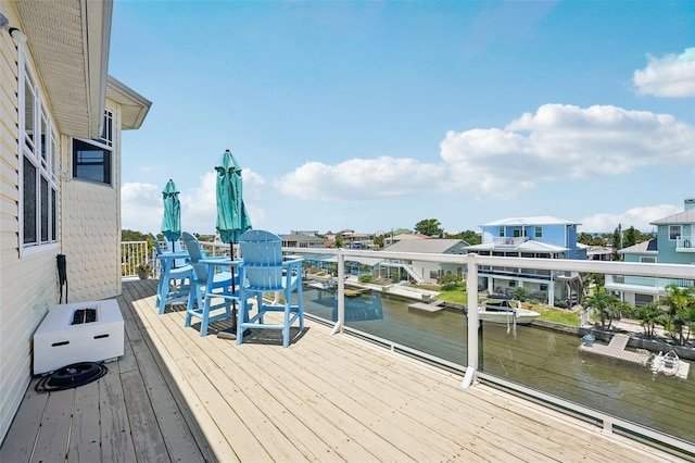 6543 Louise Ct, Hudson, FL 34667 - wooden deck featuring a water view