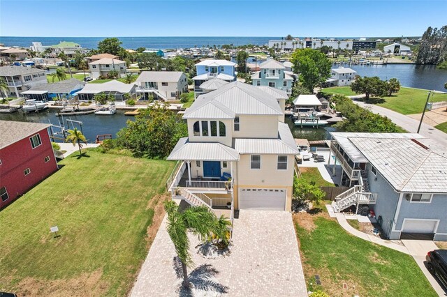 6543 Louise Ct, Hudson, FL 34667 - aerial view of residential area featuring a large body of water
