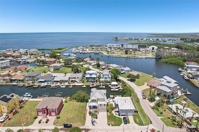 6543 Louise Ct, Hudson, FL 34667 - aerial perspective of suburban area with a large body of water