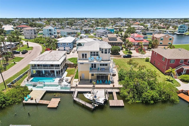 6543 Louise Ct, Hudson, FL 34667 - aerial perspective of suburban area featuring a large body of water
