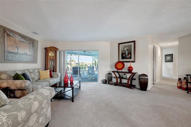 9619 Towanda Ln, Port Richey, FL 34668 - living area featuring carpet flooring and a textured ceiling
