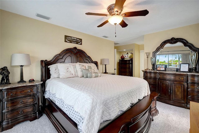 9619 Towanda Ln, Port Richey, FL 34668 - bedroom with light colored carpet, a ceiling fan, and a closet