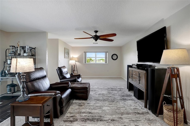 9619 Towanda Ln, Port Richey, FL 34668 - living room with ceiling fan, carpet, and a textured ceiling