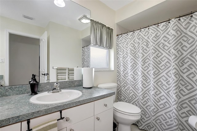 9619 Towanda Ln, Port Richey, FL 34668 - full bathroom featuring toilet and vanity