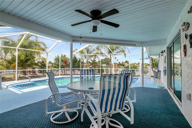 9619 Towanda Ln, Port Richey, FL 34668 - outdoor pool featuring ceiling fan, a patio, and a lanai