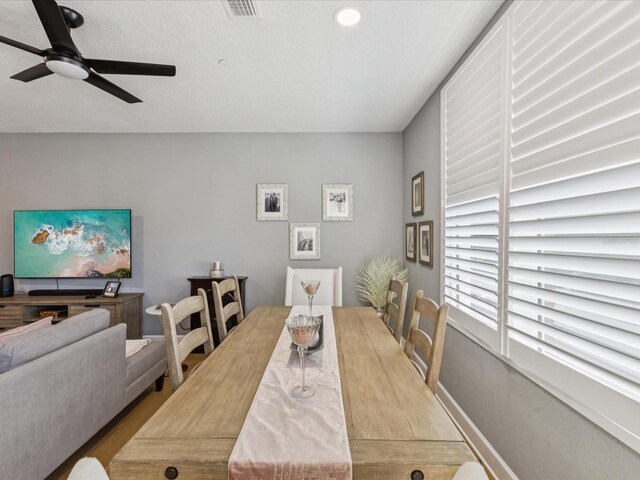 1340 Bayshore Blvd Unit 502, Dunedin, FL 34698 - dining space with a ceiling fan, wood finished floors, and recessed lighting