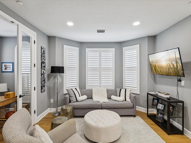 1340 Bayshore Blvd Unit 502, Dunedin, FL 34698 - living area featuring wood finished floors and recessed lighting