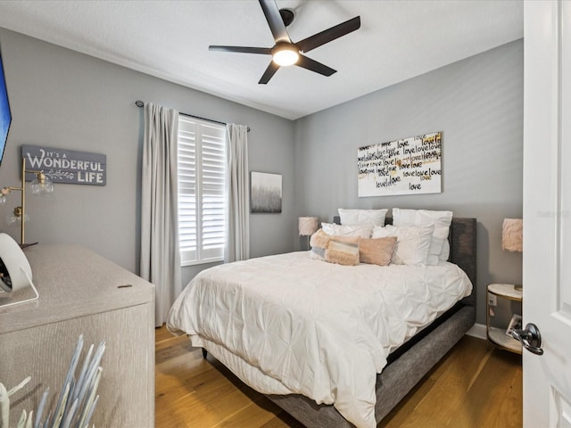 1340 Bayshore Blvd Unit 502, Dunedin, FL 34698 - bedroom featuring wood finished floors and a ceiling fan