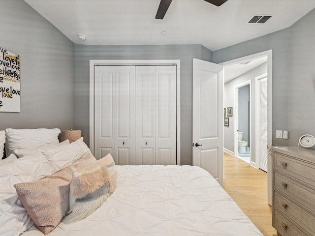 1340 Bayshore Blvd Unit 502, Dunedin, FL 34698 - bedroom featuring light wood-type flooring, a closet, and a ceiling fan