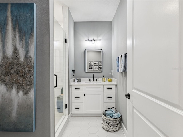 1340 Bayshore Blvd Unit 502, Dunedin, FL 34698 - bathroom with vanity, a shower stall, and tile patterned floors