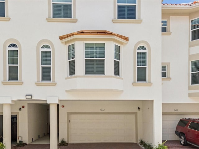 1340 Bayshore Blvd Unit 502, Dunedin, FL 34698 - multi unit property with stucco siding and an attached garage