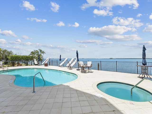 1340 Bayshore Blvd Unit 502, Dunedin, FL 34698 - community pool with a patio area, a community hot tub, and a water view