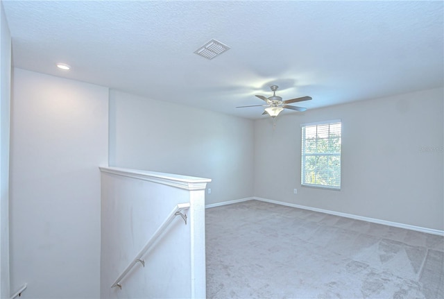 208 English Heritage Pl, Dover, FL 33527 - spare room featuring light colored carpet, a ceiling fan, and recessed lighting