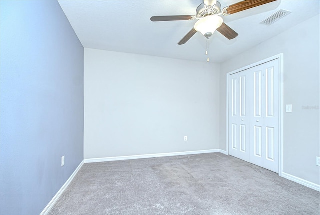 208 English Heritage Pl, Dover, FL 33527 - unfurnished bedroom featuring carpet floors, a closet, and a ceiling fan