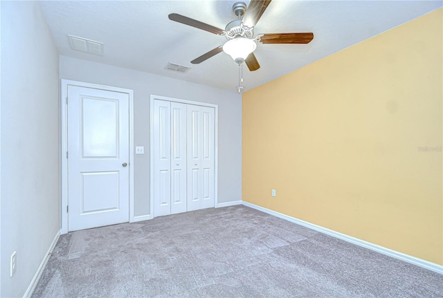 208 English Heritage Pl, Dover, FL 33527 - unfurnished bedroom featuring carpet, a closet, and a ceiling fan